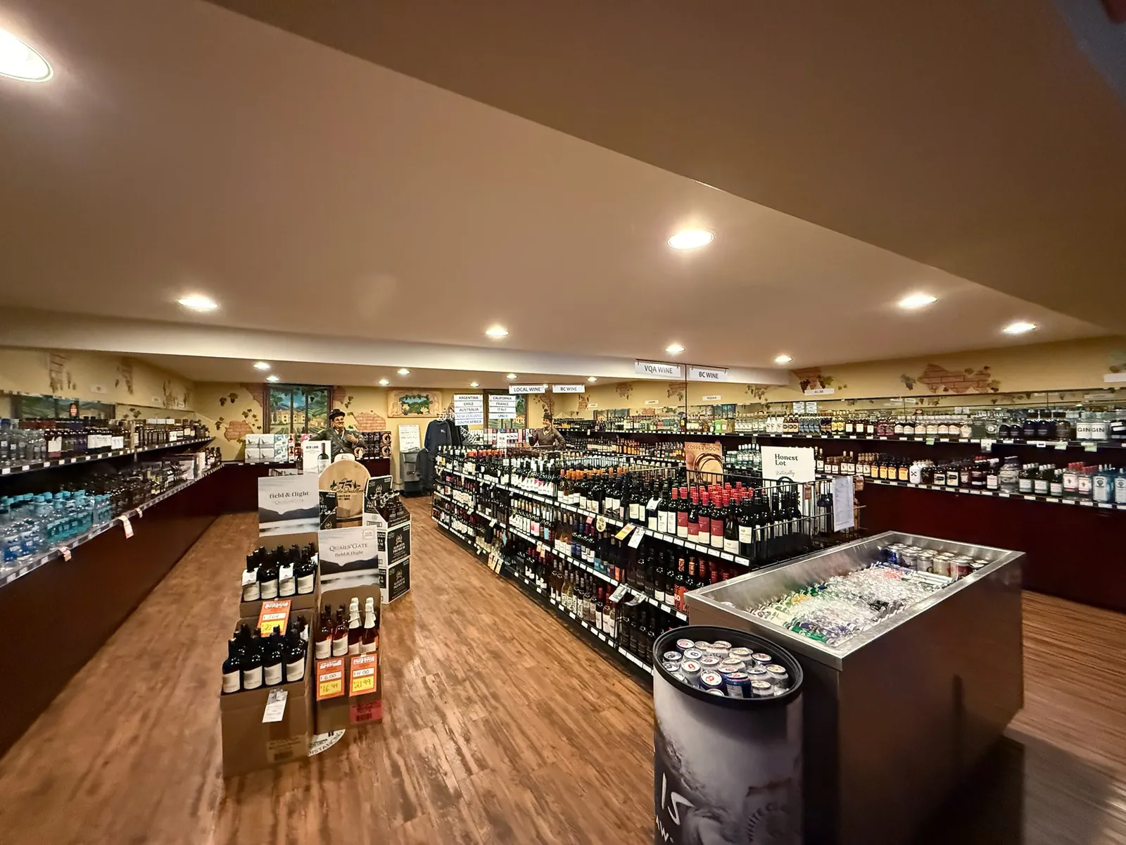 Wine aisles and BC and VQA shelves inside the Black Swan Liquor Store in Shawnigan Lake